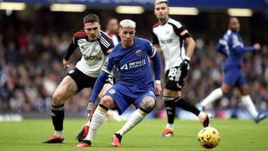 Chelsea's Enzo Fernandez holds off Fulham's Joao Palhinha
